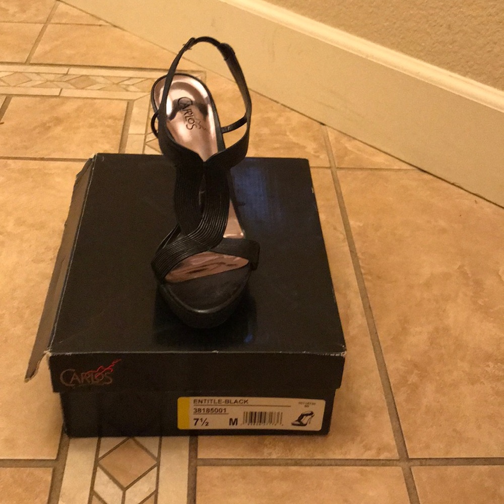 Black Carlos Santana open toe slide in heels.
